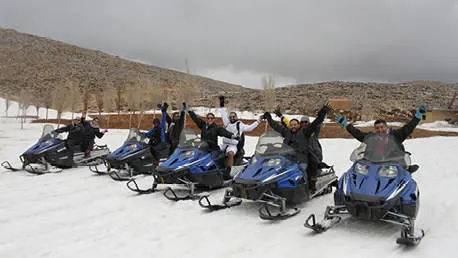 Snowmobiles in the mountains